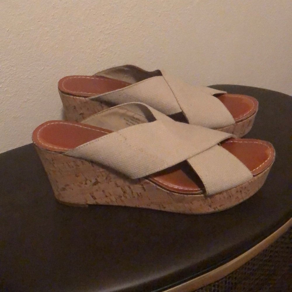 Sandals with cork wedge heel.